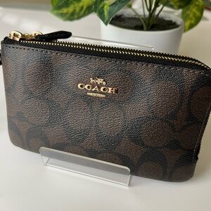Coach Signature Brown and Black double zip wristlet in Signature Canvas